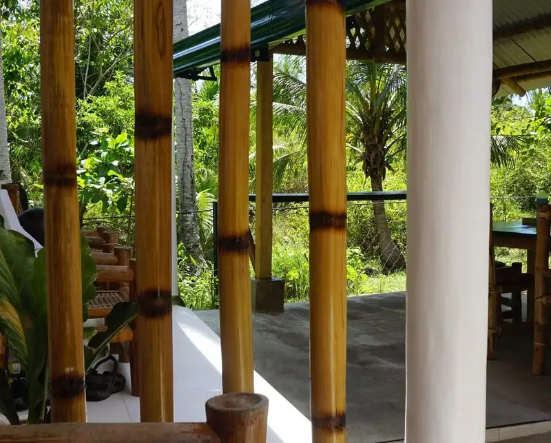 Garden View Room at sunset — eco guesthouse Anda Bohol